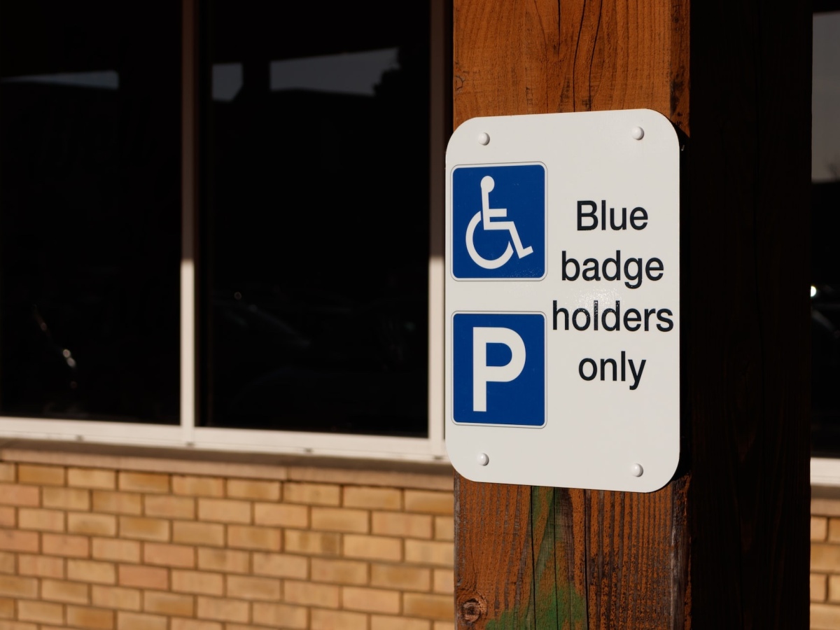 How can car dealerships support people with disabilities?